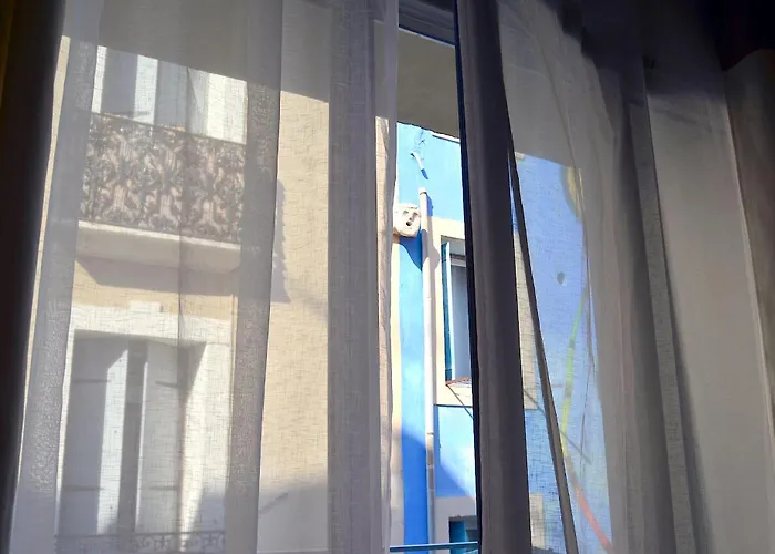 Charmante maisonnette au coeur de ville avec balcon - 70 m2